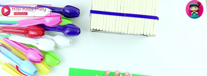 Make the leaves: Fold and cut green A4 paper into leaf shapes.