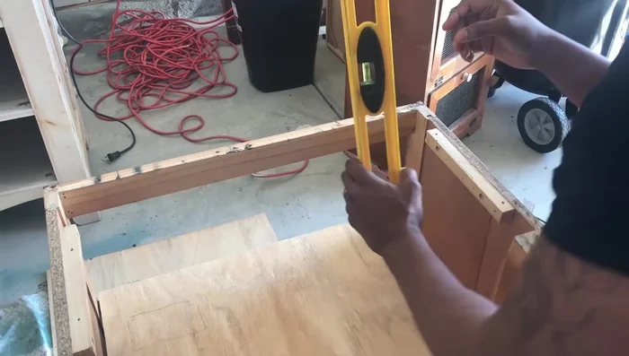 Attach the base pieces to the plywood using a nail gun.