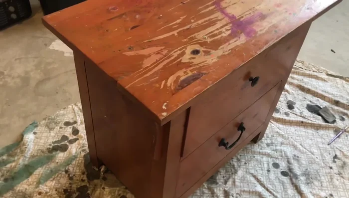 Remove the top of the dresser.