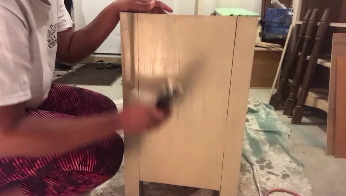 Blend any paint that seeped through using your hands.