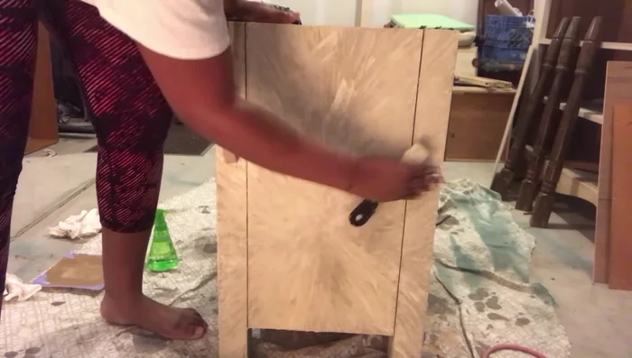 Blend any paint that seeped through using your hands.