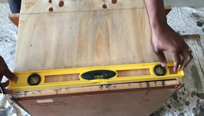 Attach the base pieces to the plywood using a nail gun.
