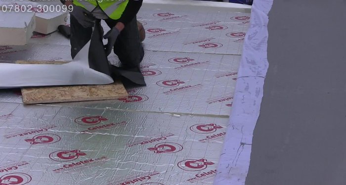 Showing examples of problems with gluing insulation, where the foil has separated from the backing.