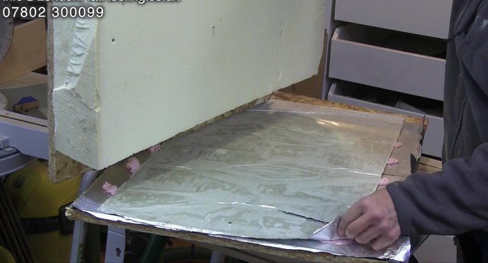 Showing examples of problems with gluing insulation, where the foil has separated from the backing.