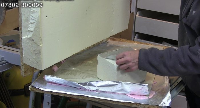 Analyzing a failed GRP roof installation with deteriorating nails, illustrating the risk of solid fasteners.