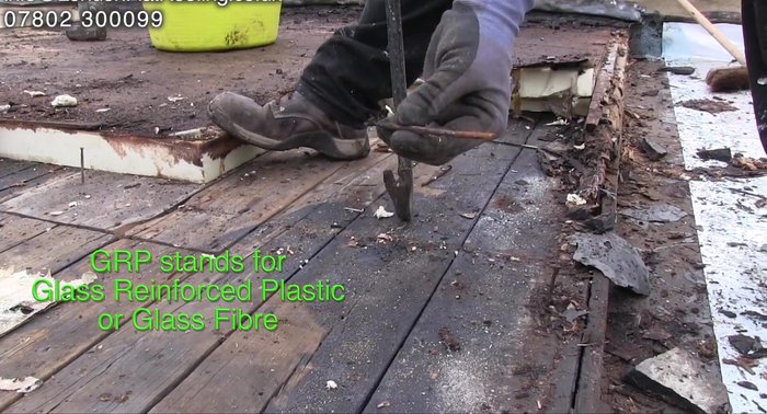 Analyzing a failed GRP roof installation with deteriorating nails, illustrating the risk of solid fasteners.