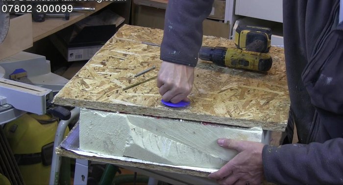 Inspecting the firmly broken fixings for proper installation.