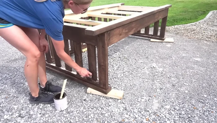 Hang the swing using the rope kit, adjusting rope length as needed.