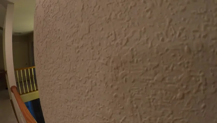 Final knockdown: Use a soft knockdown tool (like a garage door threshold) to smooth the surface and create a uniform texture (474.16).