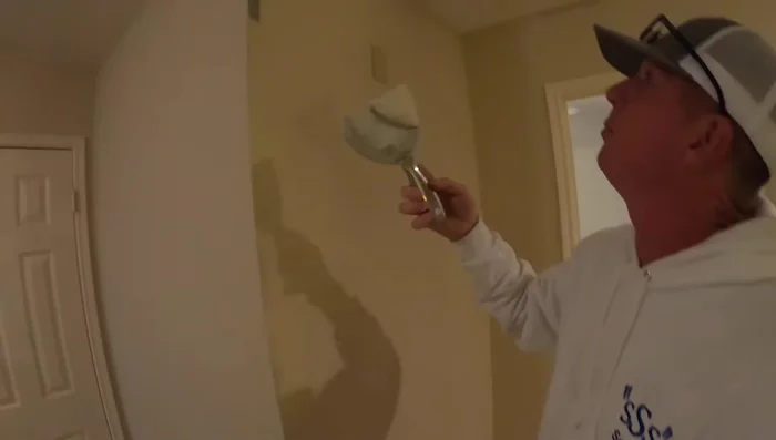 Apply nails: Place nails along the edge of the corner bead, ensuring the nail heads are flush against the metal to avoid bending the bead (63.359).