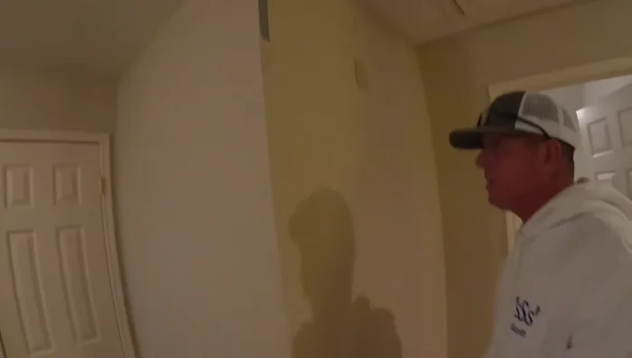 Apply plaster & tape: Apply a small amount of plaster along the cracked corner bead, and then firmly embed the fiber tape onto the wet plaster, pressing to eliminate air bubbles. Extend the plaster and tape slightly beyond the crack (58.8).