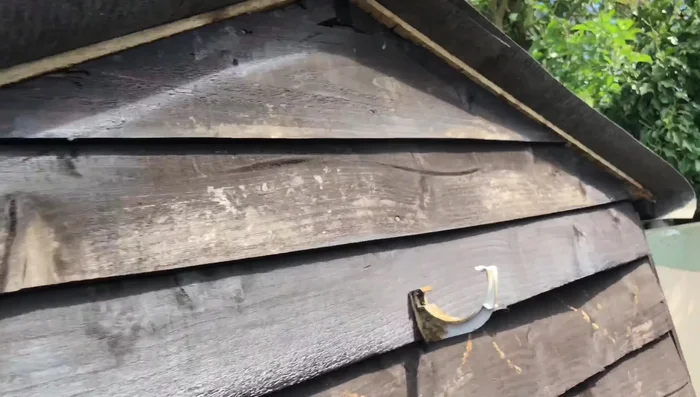 Install roofing felt, ensuring the edges are folded over completely to prevent water ingress.