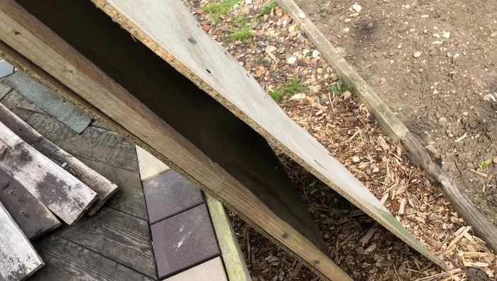 Install new pieces of wood. Ensure they are straight and properly sized. This step might involve some cutting.