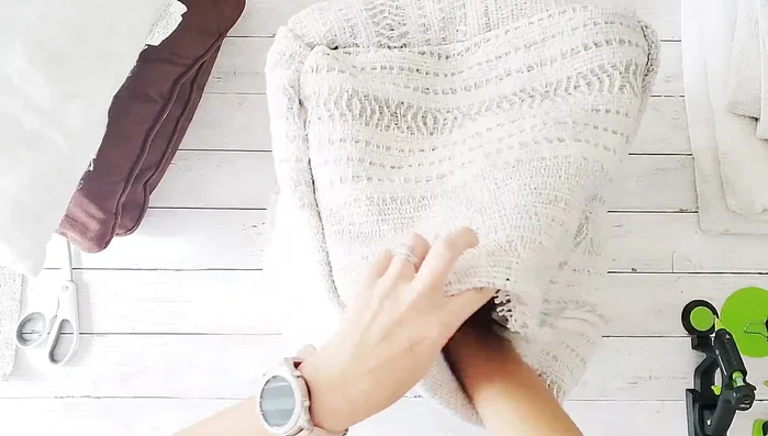 Fold in the final corner, creating a fake seam and glue it closed.