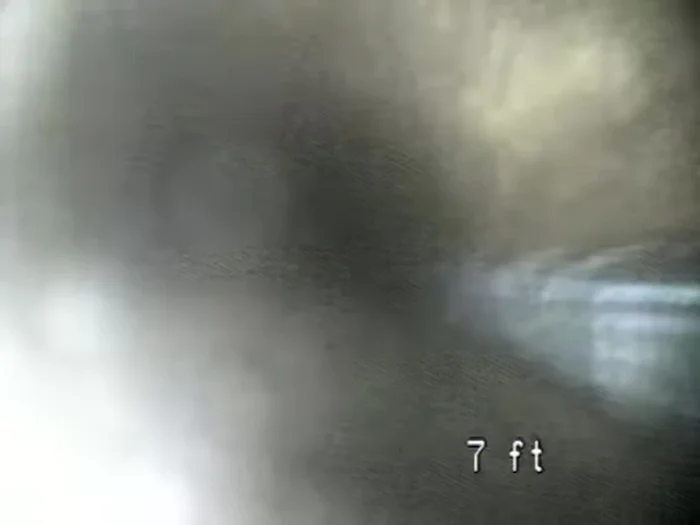 Use the hose as a makeshift snake to clear the remaining soft clog.