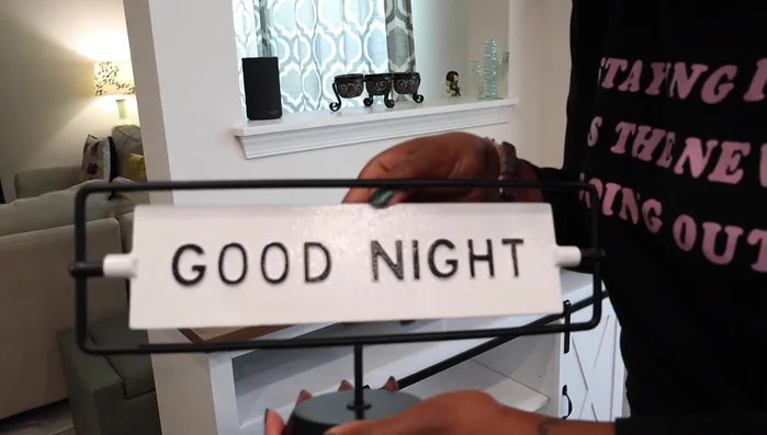 Add decorative items to the lazy susan (faux plant, cream pourer).