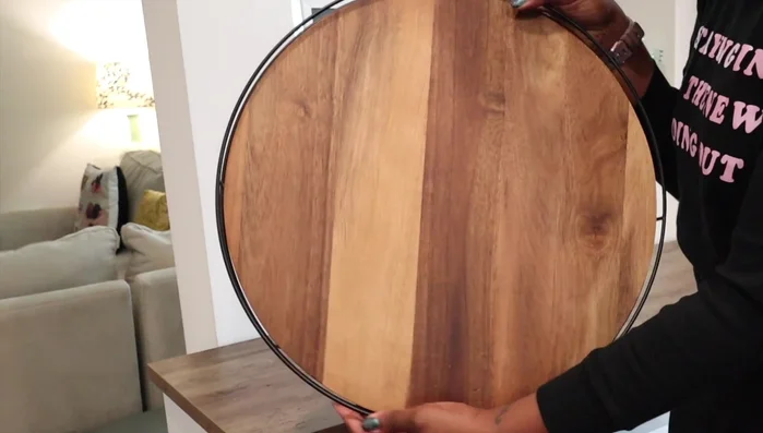 Add decorative items to the lazy susan (faux plant, cream pourer).