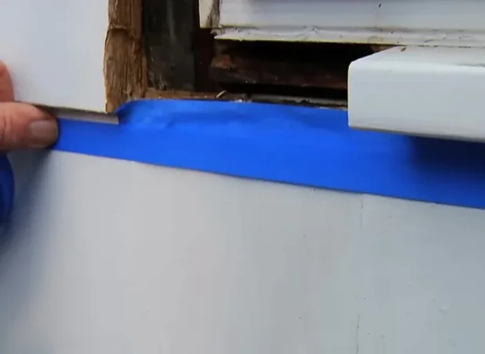 Remove masking tape once resin begins to set; remove high spots with chisel.