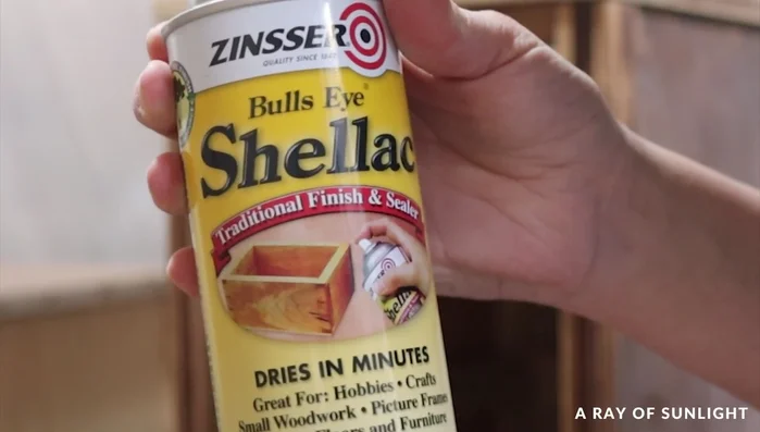 Apply two or three more coats of paint, sanding lightly between coats if necessary.