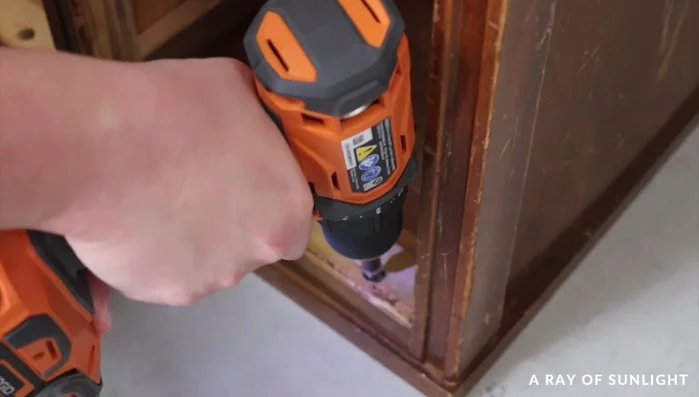Remove the wood and drawer tracks.