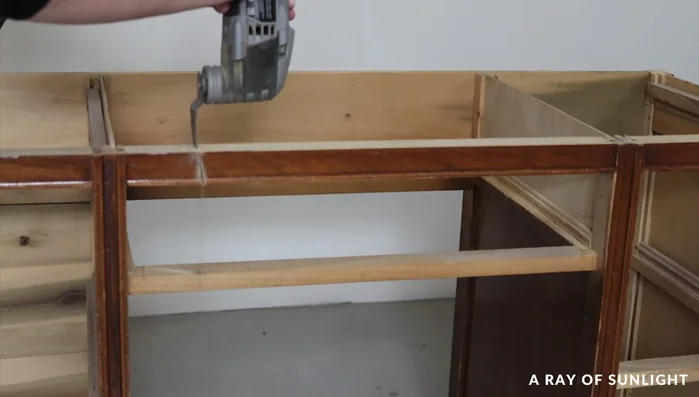 Remove the wood and drawer tracks.
