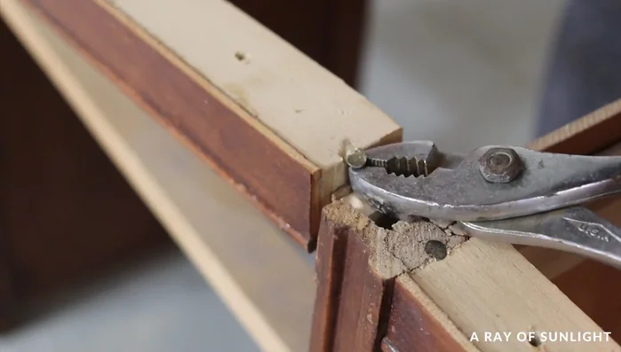Remove the wood and drawer tracks.