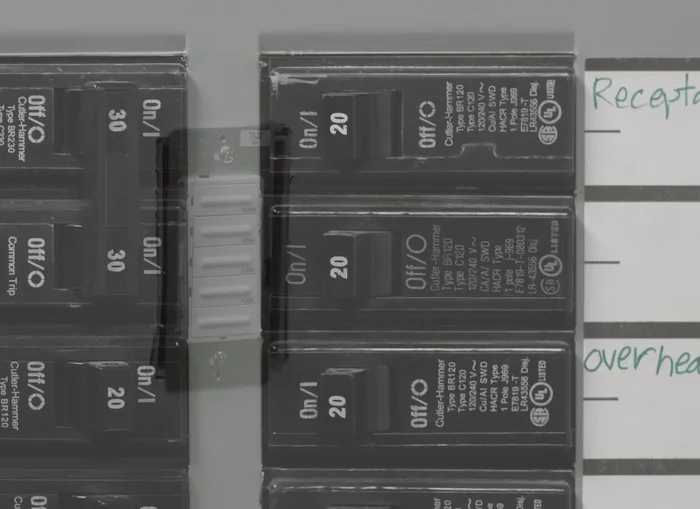 Turn off power, tighten mounting screws, and attach the wall plate. Restore power.