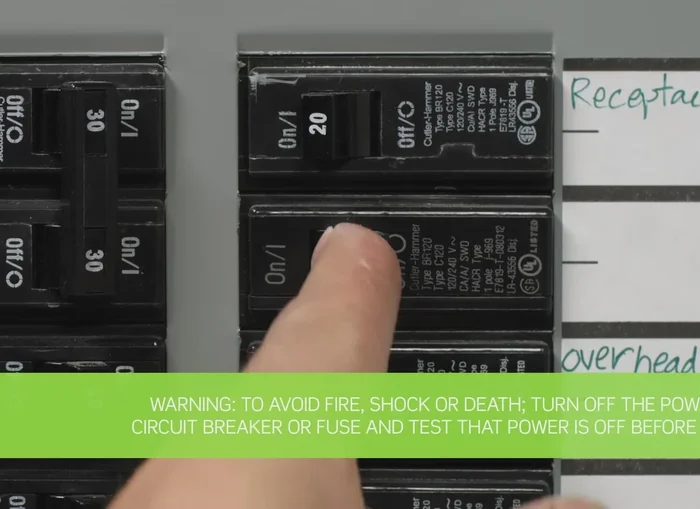 Turn off the power at the circuit breaker and use a voltage tester to ensure the power is completely off.
