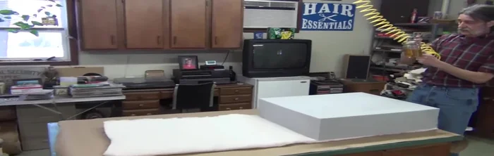 Apply adhesive (K grip recommended) to the new foam core and the cushion's inner surface.