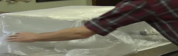 Carefully remove the vacuum and silk film, ensuring the Dacron fill remains undisturbed.