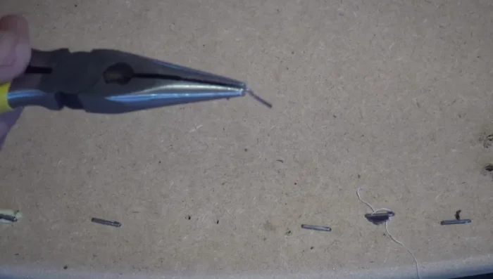 Remove remaining staples from the wood backing.