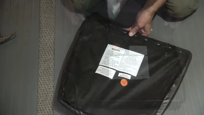 Attach the cushion to the chair frame with screws.