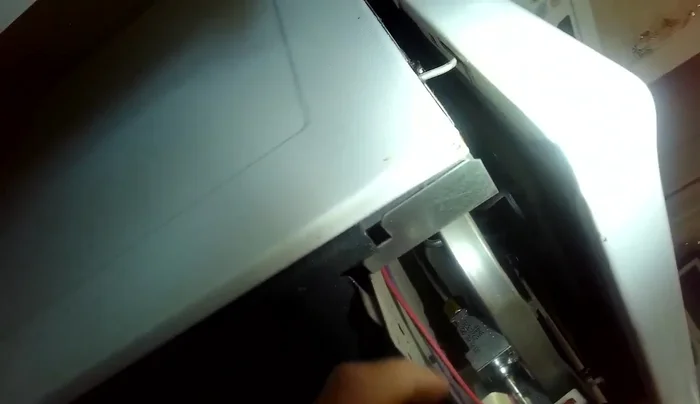 Install the new burner valve, ensuring the seal is in place. Secure with the quarter-inch screw.