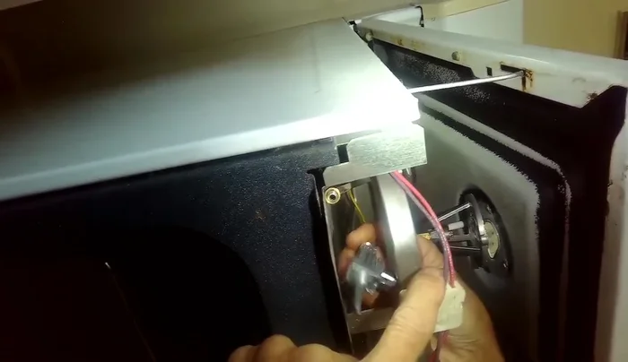 Install the new burner valve, ensuring the seal is in place. Secure with the quarter-inch screw.