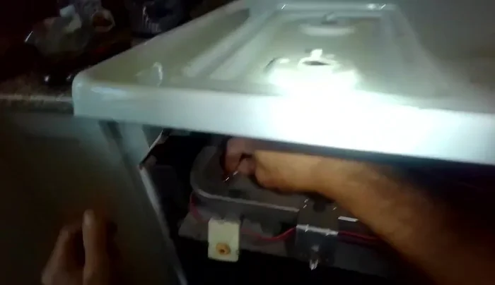 Attach the gas pipe to the new valve, ensuring a tight but careful connection to avoid damaging the brass or aluminum piping.