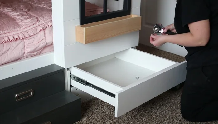 Install drawer fronts: Install drawer fronts to match shiplap panel style.