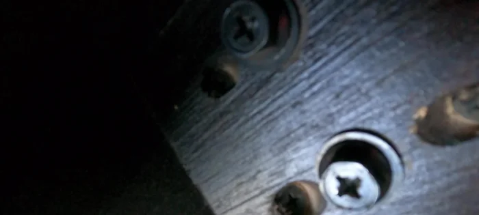 Locate the bolts securing the legs to the table. (Note: Most tables use either bolts or screws.)