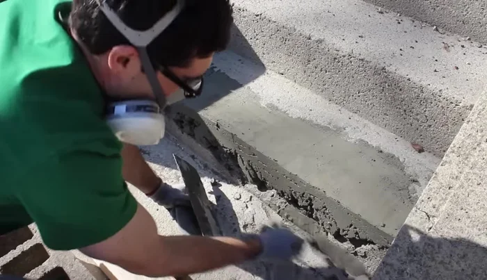 Round the edges of the new step using an edging tool.
