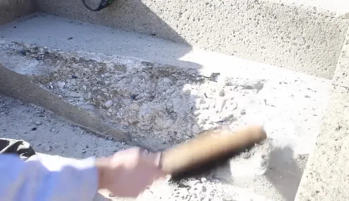 Thoroughly dust off the step using a shop vac to ensure proper bonding.