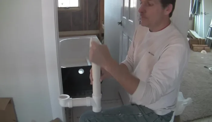 Check the level of the tub's surface. If uneven, use the provided thinner gasket to compensate.