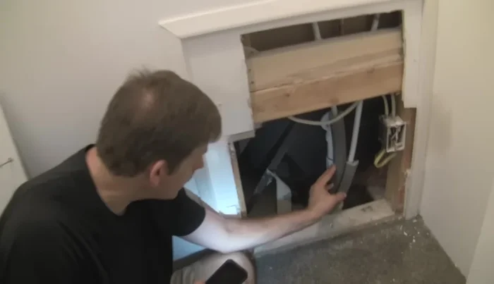 Confirm that all connections are secure and the drain assembly is properly aligned and level before testing.