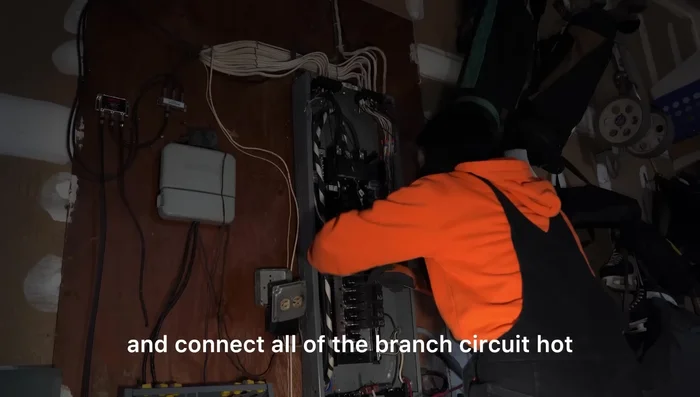 Install breakers and connect branch circuit conductors.