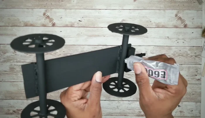 Attach the fork handle to the planter using E6000 and hot glue, covering the prongs with cardstock and hot glue.