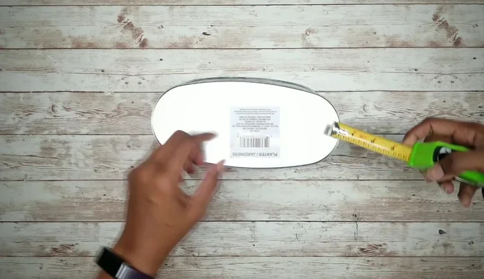 Attach the fork handle to the planter using E6000 and hot glue, covering the prongs with cardstock and hot glue.