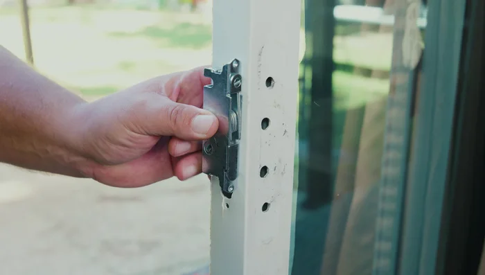 Align the locking tab and insert it into the hole.