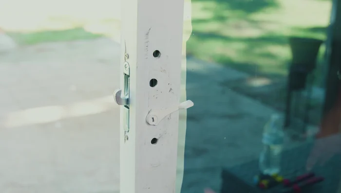 Align the locking tab and insert it into the hole.