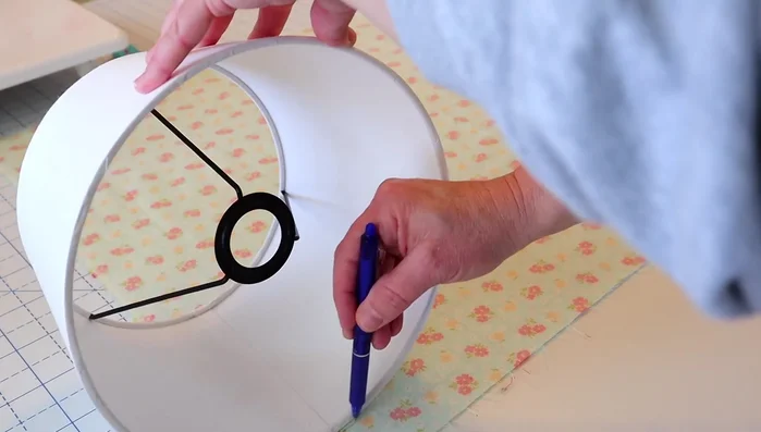 Connect the two endpoints of your tracings with a straight line, extending about one inch past the seam on both sides.