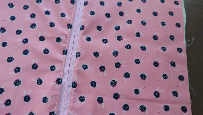 Turn the bag right side out. Close the opening by hand stitching or machine stitching.