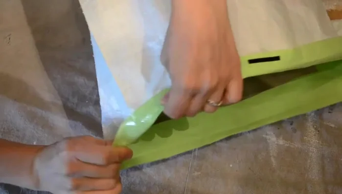 Fold down the top edges and sew them together to create a clean seam.