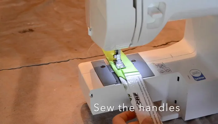 Fold the handle strips in half and sew them together to create sturdy handles.